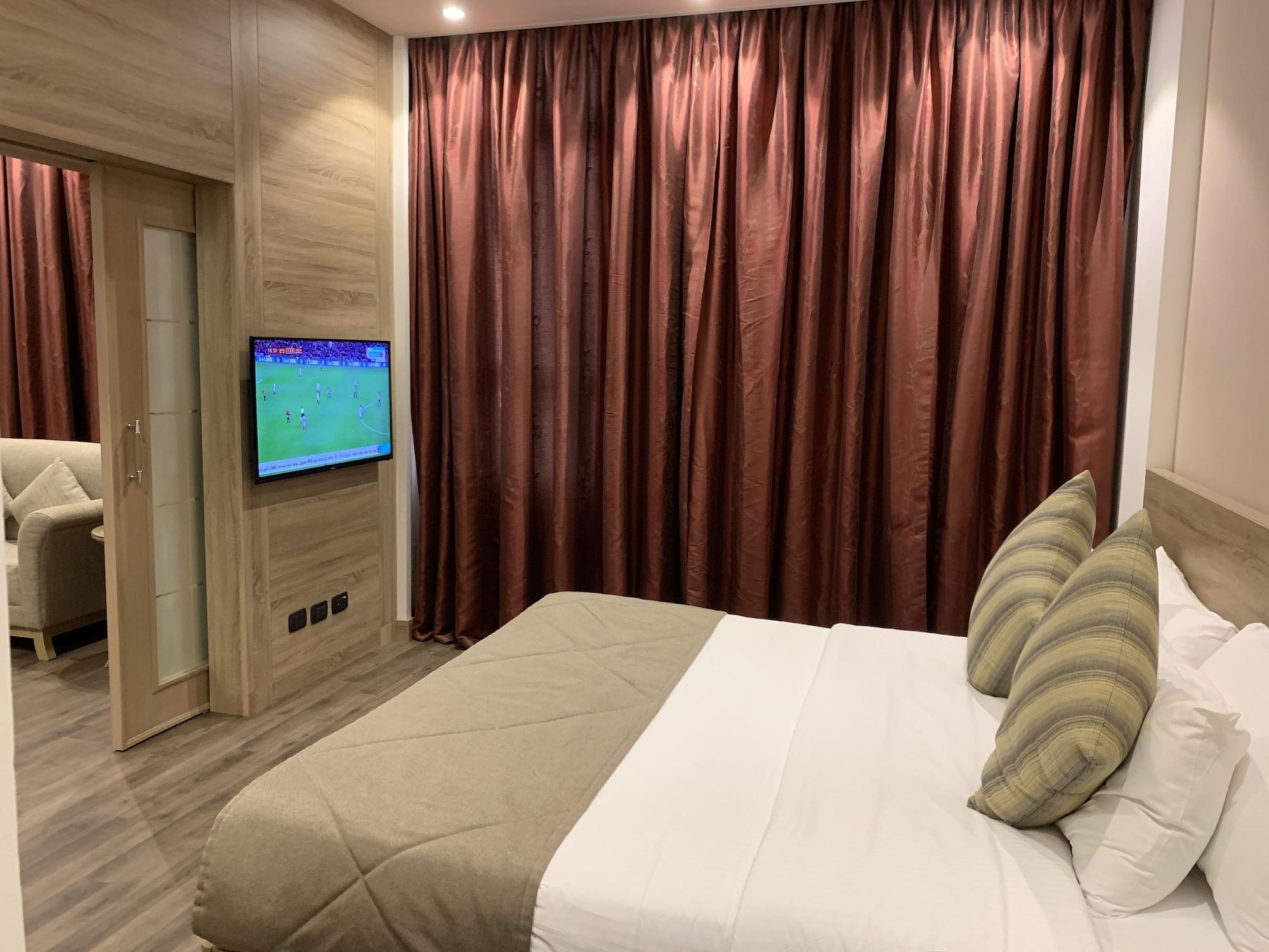 Carlton Al Moaibed Hotel Dammam Exterior photo A bedroom in the hotel