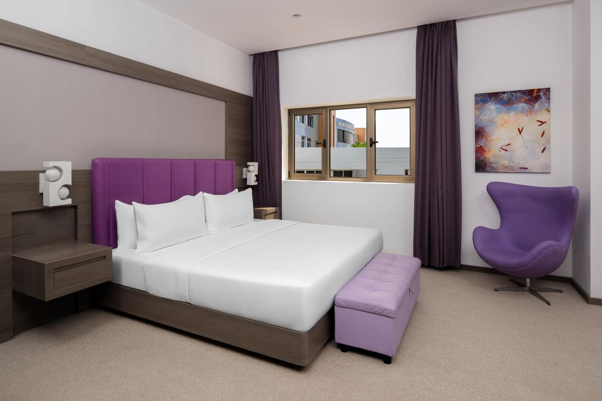 Carlton Al Moaibed Hotel Dammam Exterior photo A bedroom at the hotel