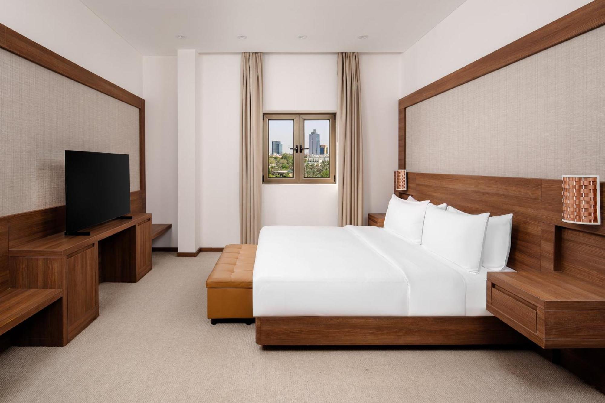 Carlton Al Moaibed Hotel Dammam Exterior photo A bedroom at the hotel